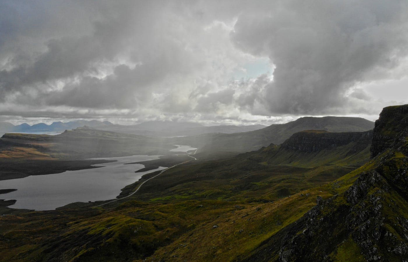 The Old Man of Storr rising above mist on the Isle of Skye